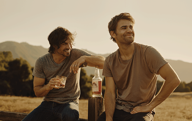 Paul Wesley and Ian Somerhalder drinking Brother's Bond Bourbon