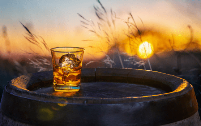 Whisky glass in the sunset