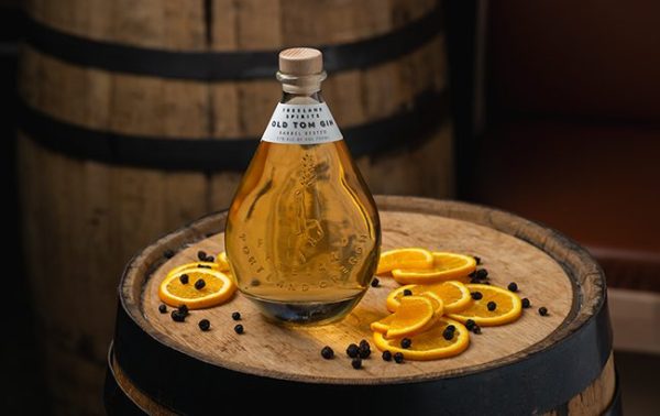 Freeland ages gin in Uncle Nearest barrels