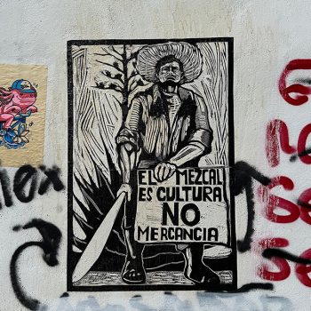 Oaxaca street art which reads: Mezcal is culture, not merchandise