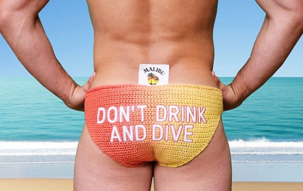 Tom Daley dons colour-changing trunks for Malibu