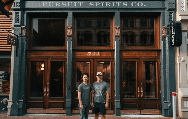 Kenny Coleman and Ryan Cecil, founders of Pursuit Spirits, in front of the new Whiskey Row site