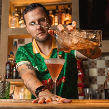 San Patricios Jack behind the bar