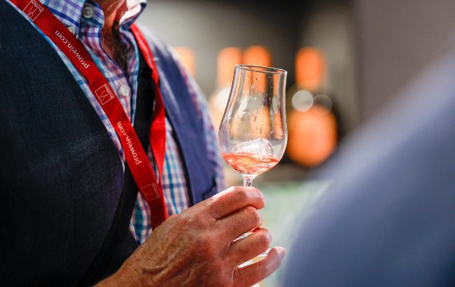Prowein 2025 man with glass in hand