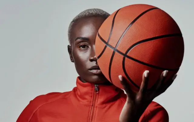 Woman holding a basketball