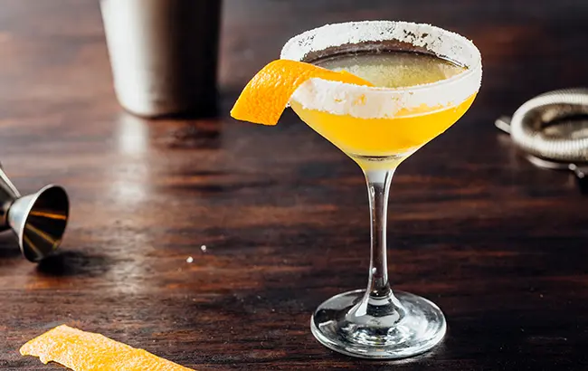 Sidecar Cocktail booze brandy, triple sec liqueur and fresh lemon juice garnish with orange twist