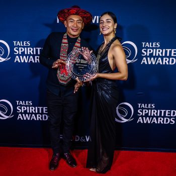 Representatives of Jean Trinh poses on the red carpet after accepting the Tales Visionary Award at the 20th Annual Spirited Awards on July 23, 2026 in New Orleans, LA, USA. (Photo by Caitlyn Ridenour/Tales of the Cocktail)